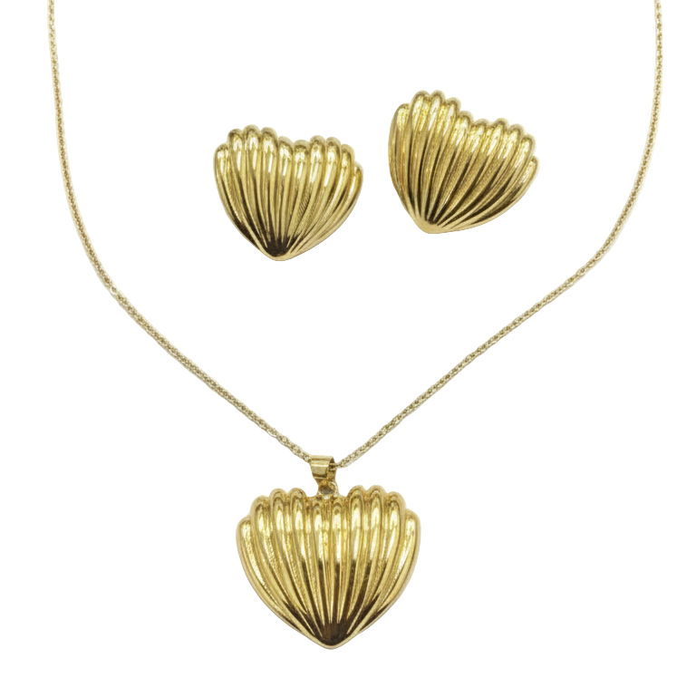 Gold heart-shaped necklace and earrings on a white background