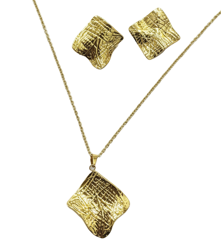 Gold jewelry set with necklace and earrings on a white background