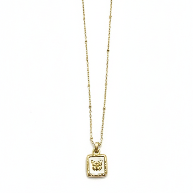 Gold necklace with a square pendant featuring a butterfly design on a white background