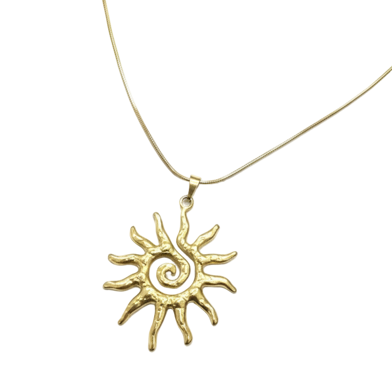 Gold sun-shaped pendant on a white background
