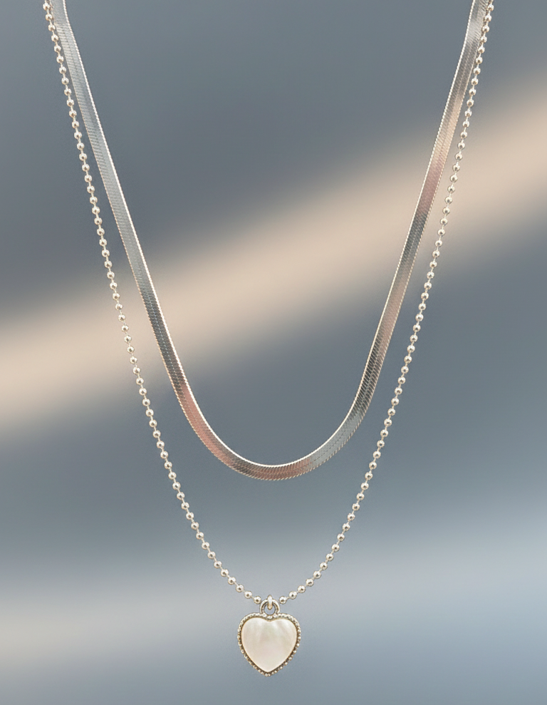 Necklace with a heart-shaped pendant on a gradient background